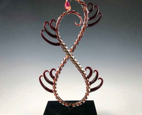 Andrew Jackson Pollard glass sculpture entitled "Gold Ruby Dichroic Twist"