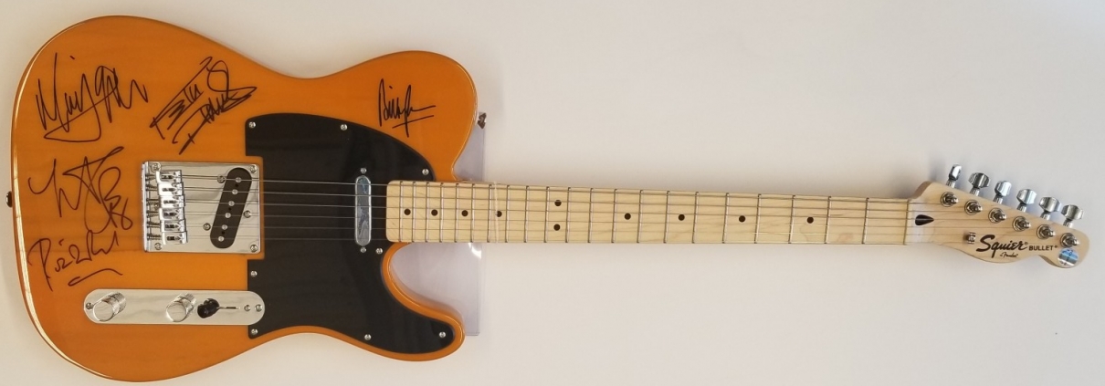 Squier Bullet signed by members of the Rolling Stones